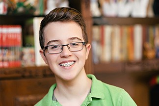 Boy Smiling with Braces
